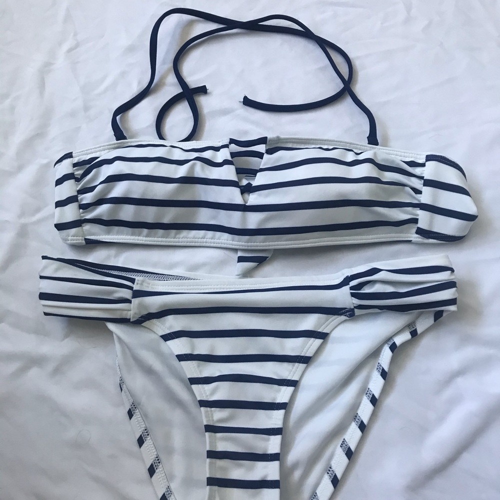 Brand new swimsuit set.  Size small.
